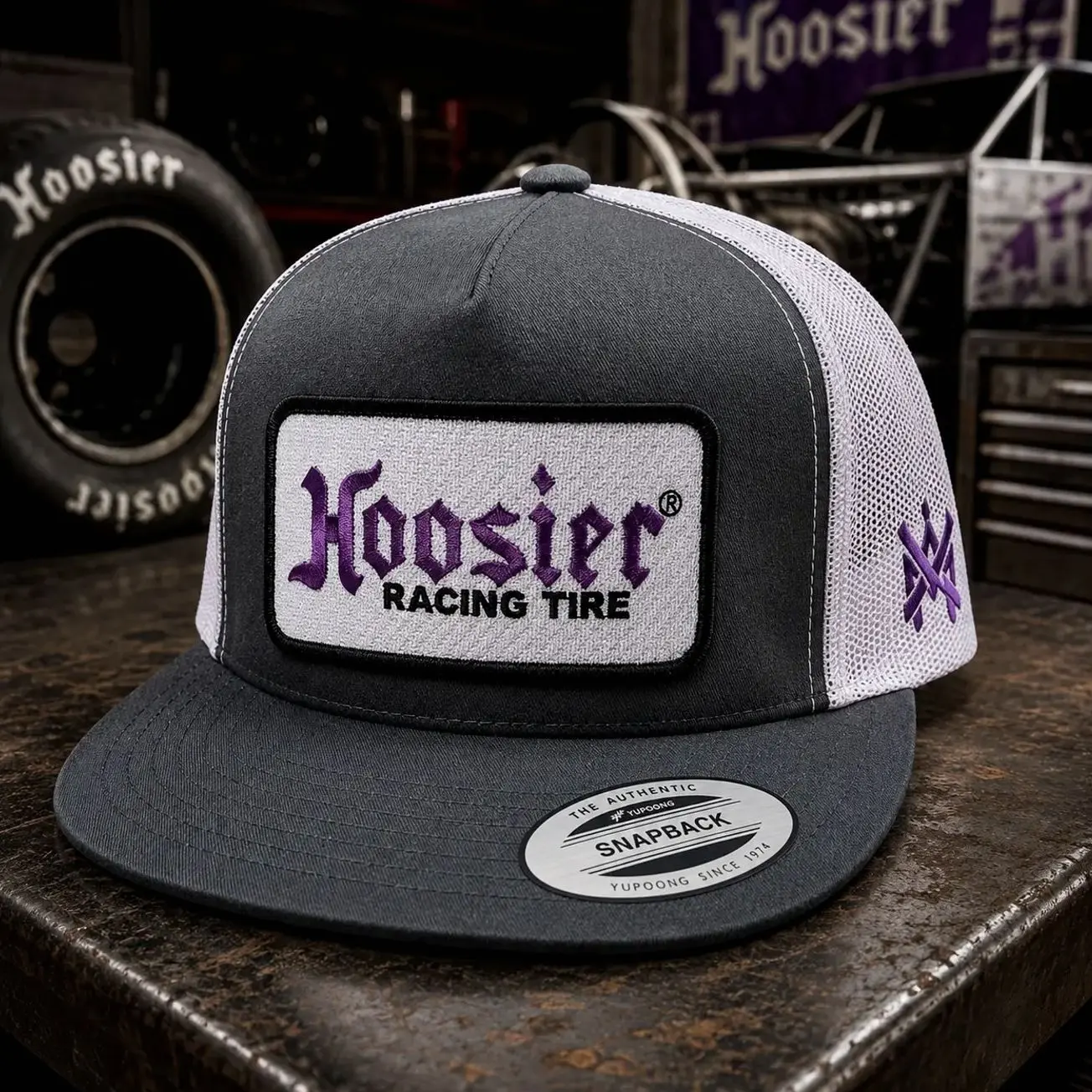 [BEST SELLER 2026] Hoosier Racing Tire Trucker Hat, Gray and White Mesh Snapback Cap, Vintage Racing Style Hat, Embroidered Hoosier Logo Patch, Motorsport Garage Workwear Headwear, Classic Flat Bill Cap for Racing Fans and Car Enthusiasts
