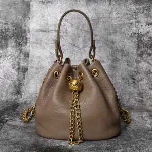 Ladies' First-Layer Cowhide Bucket Bag, Genuine Leather Handbag with Golden Hardware, Detachable Shoulder Strap with Chain Decoration, Elegantly Stylish Design, Multifunctional Fashion Accessory | Elegant Design | Vegan Handbag