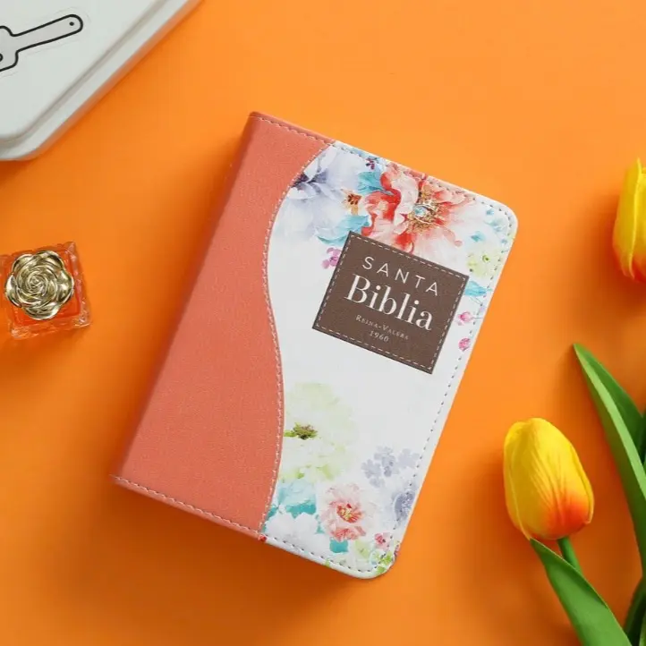Santa Biblia Pocket Bible with Floral Design and Soft Orange Cover for Daily Devotions
