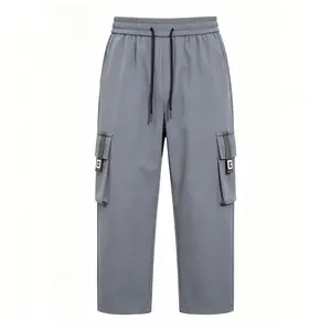 Men's Cargo Pants, Techwear Pants, Streetwear Pants, Utility Pants，Grey Cargo Pants, Multi-Pocket Pants, Elastic Waist Drawstring Pants, Relaxed Wide Leg Pants，Techwear Outfit, Gorpcore Style, Neutral Streetwear, Urban Casual Wear
