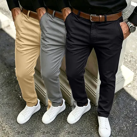 Classic cotton slim fit chino trousers with front pockets and belt loops, smooth lightweight fabric, tailored tapered silhouette, versatile daily casual bottoms for polished modern mensfashion styling.