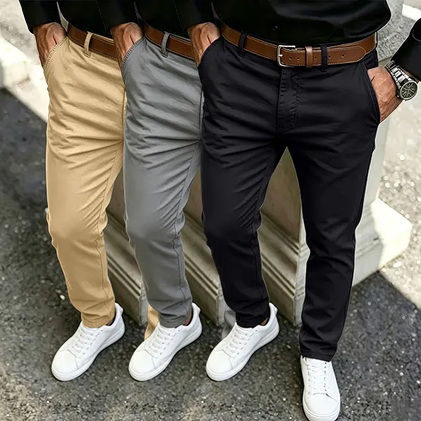 Classic cotton slim fit chino trousers with front pockets and belt loops, smooth lightweight fabric, tailored tapered silhouette, versatile daily casual bottoms for polished modern mensfashion styling.