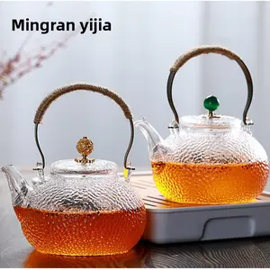700ml hammered glass teapot with copper handle heat-resistant explosion-proof and high-temperature-resistant  high borosilicate glass home-made tea glass pot for women’s beauty scented tea   fruit tea