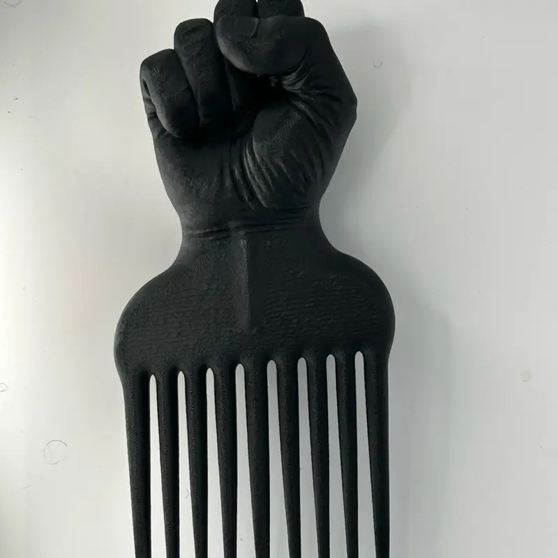 Giant Black Fist Pick