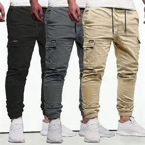 Men’s solid-color tactical work pants with multiple pockets and a drawstring design; durable outdoor training pants available in multiple colors, suitable for fishing, outdoor activities, work, hiking, camping, and spring and autumn wear. Activewear