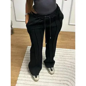 Women’s striped straight-leg pants with a drawstring waist and pockets, featuring an elastic waistband, suitable for all seasons