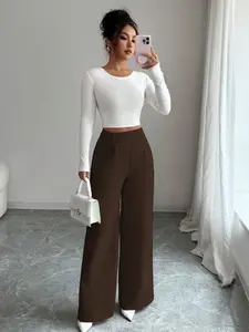 Solid dark brown clothing without patterns, featuring a high-waisted, wide-leg design. The style is minimalist and suitable for daily commuting, light business occasions, or weekend casual dates. Casual Comfy Trousers