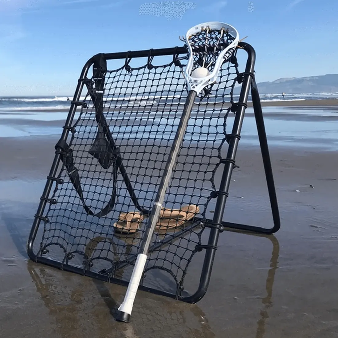 Firebounce Lacrosse Rebounder - Lightweight (Under 10 Lbs) Steel Tubing Model with Adjustable Shoulder Strap, Fast Rebound, Polyethylene Knotted Net, U Spikes, Sets Up Easily in Less Than 60 Seconds for Beach, Ground Use by Lacrosse Players