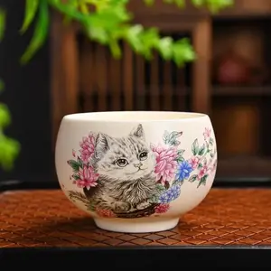 002-Hand-painted cat and its owner on a yellow teacup