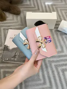 Three stylish young girls with colorful hair, featuring a trendy street style wallet with snap closure, card holder, and multiple colors—the perfect Valentine's Day gift.