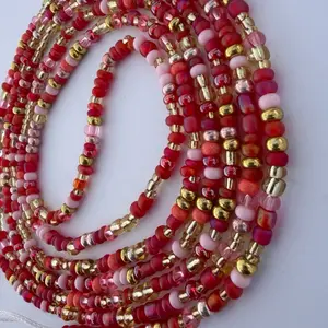 Waistbeads-this is Aloha. She is very vibrant in color orange, red, pink, gold. She is 60 inches long fits up to a 4X you can customize it to be 70 inches. This is for everyone., Chain & Link