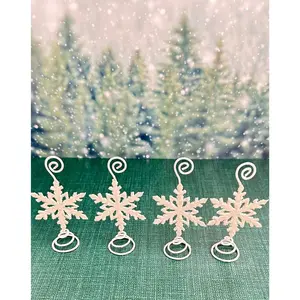 Set of 4 white glittered snowflake place card holders