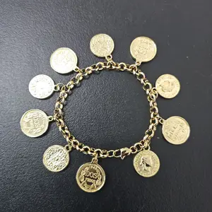 Pulso laminado con dijes-goldplated charms bracelet