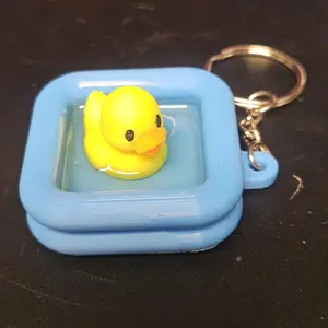 3d printed duck in pool keychain