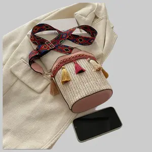 Includes shipping fee. Premium-feel 2026 new women’s fashion bag, ethnic style niche woven bucket bag, can be worn on one shoulder or crossbody, with tassels.