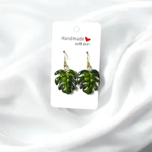 Handmade and Hand Painted Monstera Clay Earrings