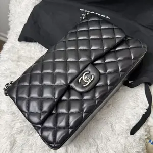 Pre-owned CHANEL Lambskin Clutches & Wristlets Classic Flap bag