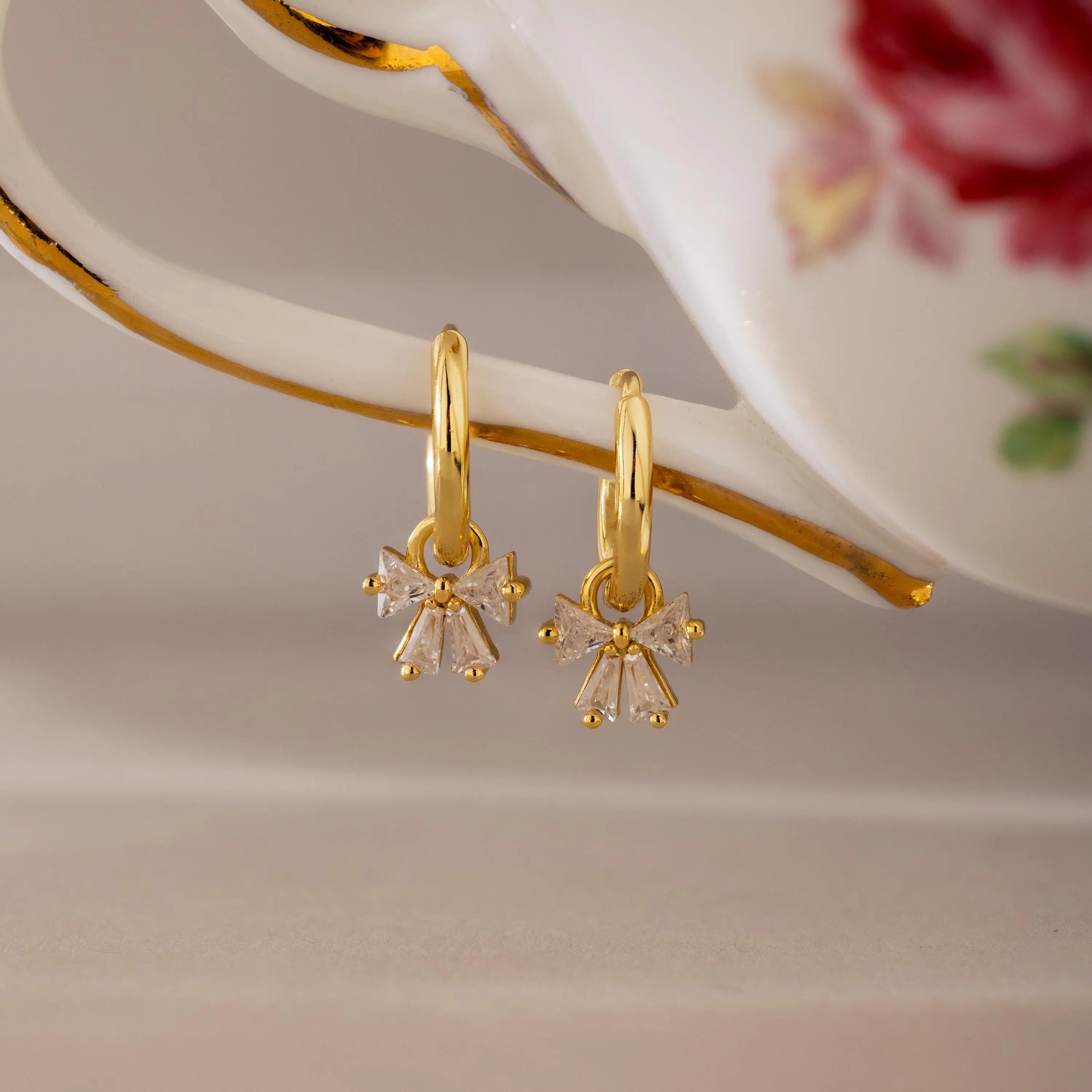 Diamond Bow Hoops by Caitlyn Minimalist - Dangling Crystal Ribbon Bow Earrings - Trendy Coquette Charm Earrings in Gold & Silver - Dainty Jewelry - Perfect Gift for Her