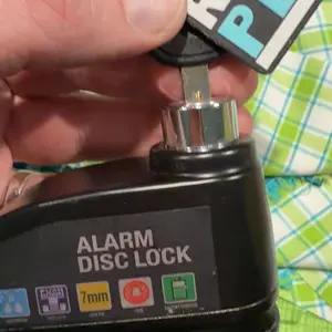 Zinc Alloy Sturdy Alarm Disc Brake Lock - 110db Alarm, Movement Alert, Anti Theft Padlock with Exceptional Strength for Motorcycles, Biker Security Accessory