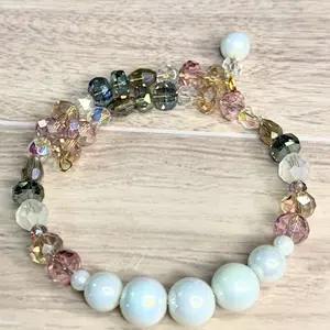 Memory Wire Bracelet with Iridescent Pearls, Colorful Beads, and Decorative Elements