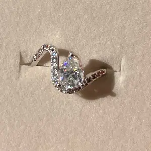 Moissanite Engagement Ring Asymmetrical Style with Sparkling Stones and Elegant Design in Rose Gold Finish