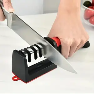 PrimPick Three-stage knife sharpening device, used for sharpening household kitchen knives and scissors. It features precise sharpening to create sharp edges and is a fast-edge-sharpening tool