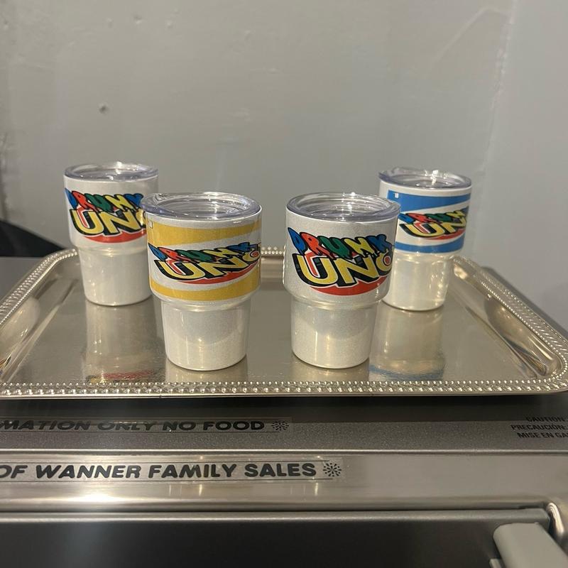 Drunk Uno with everything needed for 4 players.