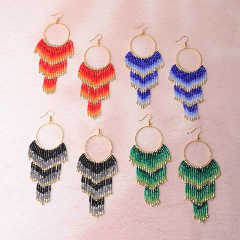 1 pair of Bohemian-style glass earrings with gradient long tassels and hand-woven beads. These elegant and classic earrings are suitable for women and would also make a great gift.