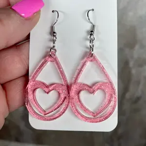 Pink heart cutout glitter gel earrings