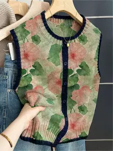 French retro style loose crew neck sleeveless color-block buttoned khaki women's sweater vest with color-block floral print. Suitable for spring and summer wear, versatile women's buttoned sleeveless knitted sweater, vacation style, casual elegant commute