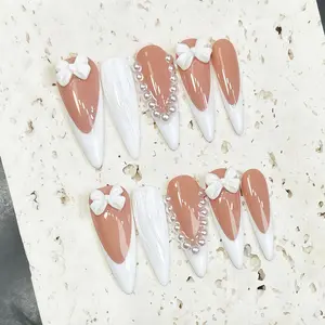 Press On Nails Set, Handmade 10PCS Long Stiletto Nude Pink French Tip Nails with White Bow, Pearl & White Swirl, Elegant Coquette Reusable Easy Apply Salon-Quality False Nails for Bridal Wedding Prom, Gift for Her