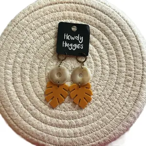 Orange leaf dangle earrings