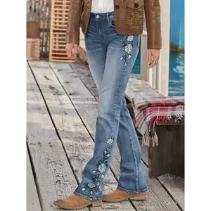 Women’s blue denim pants and jeans with an embroidered floral design on the side, comfortable and stretchy casual streetwear, perfect for travel and everyday wear GARMENTARY