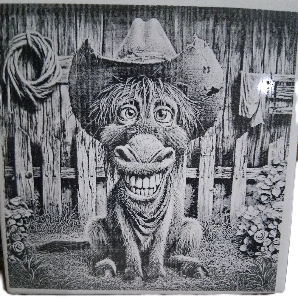 4 by 4 white tile, laser etched with a farm donkey image smiling.