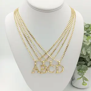 Yordy necklace with 14k gold-plated Cuban chain, initial pendant, and cubic zirconia details for women