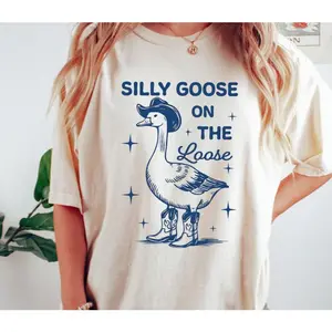 Silly Goose On The Loose Cowboy Graphic T-Shirt, Cute Western Goose Cotton Comfort Outfit, Funny Country Fashion Tee, Casual Crew Neck Beige Oversized Short Sleeve Top, Perfect Valentine’s Day & Holiday Gift For Humor Lovers