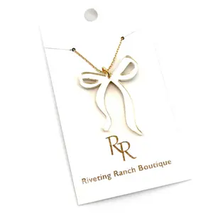 Riveting Ranch Boutique Gold Mirror Bow Necklace - Elegant Fashion Accessory for Women