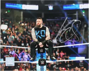 Kevin Owens WWE Autographed 8" x 10" Sitting on Turnbuckle Photograph - Fanatics Authentic Certified