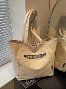Retro plaid patchwork canvas tote bag, large capacity, casual commuter shoulder bag, stylish and versatile handbag, suitable for commuting, shopping, leisure outings, and everyday accessories.