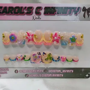 Carol's C Infinity Medium Length Square Nails with Floral and Pearl Decorations for Stylish Manicures