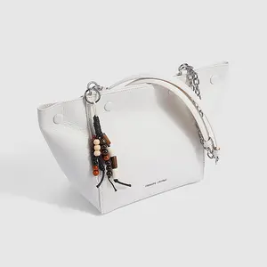 Milk Box cowhide leather women’s handbag with an original design