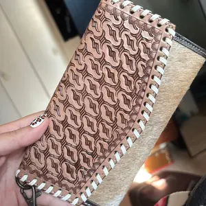 Brown Tooled leather and hide wallet