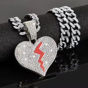 Iced Out Broken Heart Cuban Chain Necklace with Heart Pendant, Red Lightning Bolt Accent, and Shimmering Crystal Rhinestones