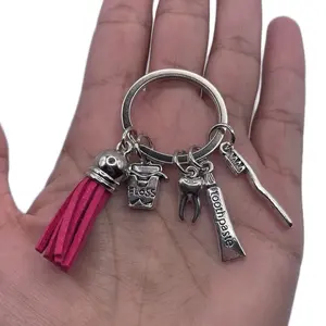 Pink Dentist Hygienist Keychain - Fashion Accessory with Toothbrush, Flosser, Mirror & Pink Tassel