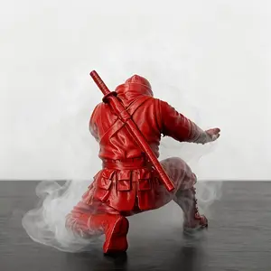 Trendy red ninja pen holder. Creative desktop organizer, holds pens securely. Samurai-style design. Unique gift for colleagues and friends