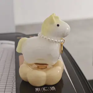 Gift box version of the Jingdezhen Internet-famous rotating crystal horse ornament, ceramic souvenir for cultural and creative scenic spots, suitable for street stalls