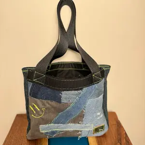 Upcycled Denim Tote Bag with Zipper Pocket & Inside Pocket, Features Distressed Design and Colorful Elements