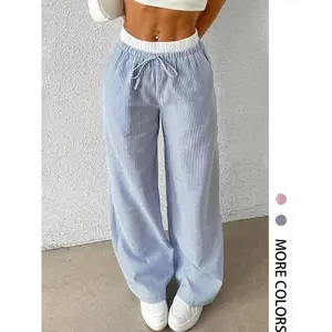 Women’s two-in-one wide-leg pants with a drawstring and striped/patch print; spring and autumn casual elastic-waist pocket pants—fashionable for everyday wear.