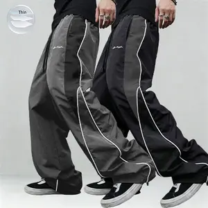 2-piece set - men's black and color-block sports pants with white side stripes and embroidered design, casual fitness wear, loose athletic trousers, stylish streetwear running pants, drawstring waistband, straight cut, polyester fiber material - men's pan