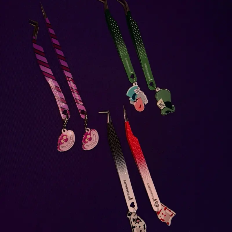 Alice Collection Tweezer Pairs with Colorful Striped Handles and Adorable Charms
